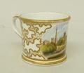 A Chamberlain's Worcester porcelain miniature mug reserve painted with a view of Worcester against a... 