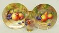 A Royal Worcester porcelain tea plate painted with apples and blackberries, with gilded edges, signe... 