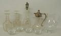 A cut glass claret jug with plated mount, and hinged lid, pair of Bohemian cut glass decanters with ... 