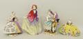 A Meissen style porcelain figure group depicting an eighteenth century style gentleman garlanding a ... 