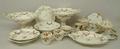 A Ridgway porcelain part dessert service early 19th century, painted with sprays of flowers and gilt... 