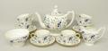 A Coalport porcelain part tea service decorated in the Pageant pattern comprising teapot, milk jug, ... 