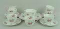 A Shelley porcelain part tea service decorated in the 'Rose and Red Daisy' pattern, comprising; brea... 