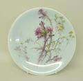 A porcelain plate, possibly a Worcester prototype, late 19th century, painted with thistles and mead... 