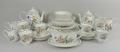 A Queen's porcelain part dinner and tea service, designed by Lilian Snelling, decorated in 'The Gard... 