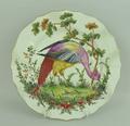 A Chelsea, gold anchor period, porcelain plate boldly painted with an exotic bird, 25cm diameter.