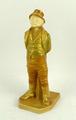 A Royal Worcester blush porcelain figure modelled as 'Paddy', circa 1910, no 835, printed mark, 18cm... 