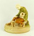 A Royal Worcester blush porcelain figure 'Decorator', circa 1909, modelled as a Sixteenth century ma... 
