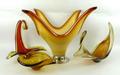 A group of Murano glass including a 1960s milk and amber glass vase raised on a chrome base, 32cm hi... 