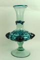A Venetian blue glass vase of baluster form, the neck with irregular collar, the body with pronounce... 