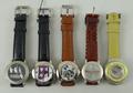 A group of Apple Corpe Beatles Watches, circa 1996, in wood or leather guitar boxes, comprising 'The... 