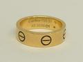 A Cartier 18ct yellow gold 'Love' ring with screw head detailing, serial no AS3539, size K, 6.7g.