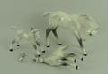 A Beswick figure of a grey foal, no 947, and two other grey foals, nos 815 and 1084. (3)
