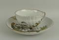 A Meissen porcelain tea cup and saucer, late 19th century, modelled after Kaendler and Eberlein as a... 