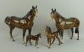A Beswick figure of a brown thoroughbred stallion, no 1772, a swish tail horse, 1st version, no 1182... 