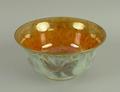 A Wedgwood butterfly lustre bowl, number 24832, the bright copper lustre interior with gilded edge a... 