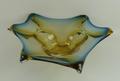 A Murano glass bowl of six sided star form with amber and blue colouring, 10 by 36cm.