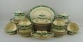 A Booths, Ribstone Ware, pottery part dinner service decorated with reserve shagreen panels, gilt hi... 
