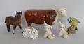 A Beswick figure of a cow, Champion of Champions, Shetland pony, two character dogs with ladybirds o... 