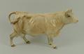 A Beswick figure modelled as a Charolais Cow, no 3075A, printed mark, 20cm long.