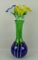 A Murano glass vase of bulbous form with blue bowl and green neck, 38cm high, and four glass long st... 