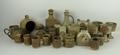 A collection of Tremar Pottery including a salt, money box in the form of a house, four goblets, a v... 