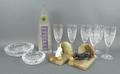 A quantity of Waterford Crystal, comprising two ashtrays, a set of six champagne flutes, together wi... 
