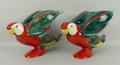 A pair of German Goebel pottery figures modelled as parrots, impressed to base 3898118, 29 by 18cm.