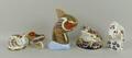 A group of Royal Crown Derby imari porcelain paperweights modelled as a frog LVIII, a Tropical Fish ... 