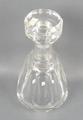 A Baccarat glass decanter, with stopper, of mallet form with vertical fluting, etched mark, 24cm hig... 