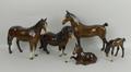 A quantity of Beswick equine figures, comprising a Shetland pony, 14cm, two horses, 18 and 20cm, and... 