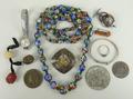 A Bulova lady's wristwatch on expandable bracelet, silver bangle, three brooches, millefiori glass f... 