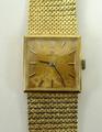 An Omega lady's 18ct gold wristwatch, square dial with gilt batons, movement no 22130498, case no 90... 
