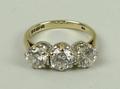 A gold, platinum and diamond three stone ring, approximately 2ct, size L, 3.2g.