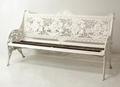 A Victorian, Coalbrookdale style, cast iron garden bench, the back rest cast with four circular flor... 