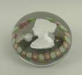 A Clichy paperweight with a sulphide portrait bust of Queen Victoria within a band of millefiori can... 
