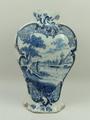 A Delftware blue and white vase, 18th century, of octagonal, baluster form painted with a riverscape... 