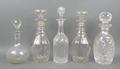 A pair of Victorian cut glass three ring decanters with mushroom shaped stoppers, 28cm, and three fu... 
