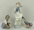 A Lladro porcelain figure modelled as a girl with a parasol, 28cm, Dahl Jensen, Copenhagen, porcelai... 