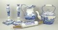 A collection of Spode comprising two candlesticks, 33cm, kettle, 30cm, jug, 32cm, and rolling pin, 4... 