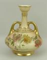 A Worcester blush porcelain vase, circa 1905, of twin handled, semi fluted baluster form painted wit... 