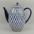 A Lomonosov porcelain part coffee service decorated in the 'Cobalt Net' pattern, comprising; coffee ... 