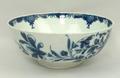 A Caughley porcelain bowl, late 18th century, painted in blue and white with flowers, crescent mark,... 