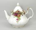 A Royal Albert Old Country Roses part tea service comprising tea pot, cake plate, six tea cups, seve... 