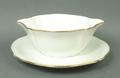 A Limoges Haviland part dinner service, the white fluted ground with gilded rims, comprising fifteen... 