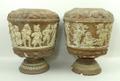 A pair of Continental earthenware vases, possibly oil lamp bases, late 19th century, moulded with a ... 