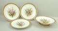 A part Royal Worcester porcelain part dessert service, circa 1875, painted with hollyhocks and meado... 