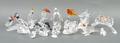 A group of Swarovski crystal bird figures, all boxed, comprising small, medium and large swans, pair... 