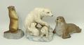 A group of Aynsley bisque porcelain figures, comprising; a Walrus, Otter and a Polar Bear with cubs,... 