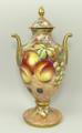 A G Delaney porcelain hand painted vase and cover of twin handled baluster form painted with fruit, ... 